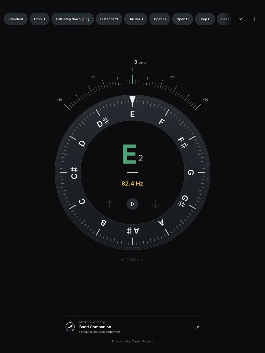 Tuner detecting E2 with its pitch meter centered and the note green